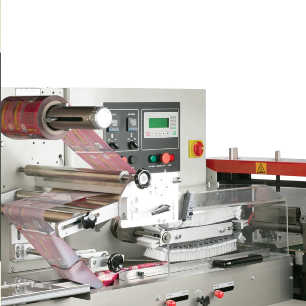 El área de envasado y sellado en un sistema automático de flow pack HFFS. El soporte del rollo de film está equipado con un rollo de film de embalaje rojo, enhebrado a través de la máquina y listo para usar. Se muestra el logotipo industrial de JORES TECHNOLOGIES® y una leyenda que dice software fácil de usar con pantalla táctil.