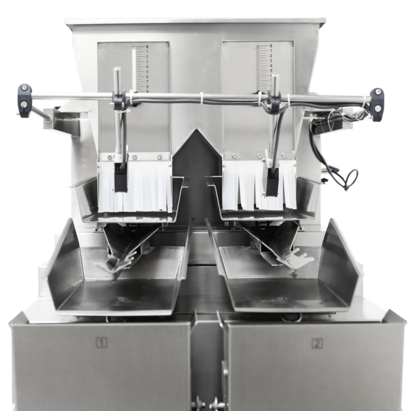 Vista cercana de la pesadora lineal de doble cabezal JORES TECHNOLOGIES® de acero inoxidable para 4000 ml