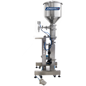 Vista frontal de la llenadora neumática vertical de pistón para alta viscosidad JORES TECHNOLOGIES® con pedal y tolva calentada
