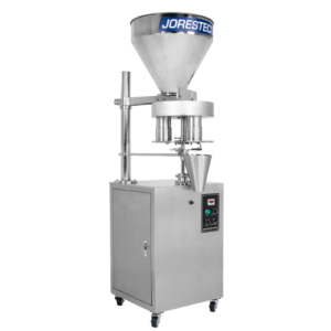 El llenador volumétrico semiautomático JORES TECHNOLOGIES® de acero inoxidable para productos granulares de flujo libre en vista diagonal