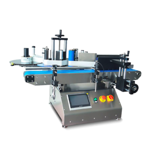 Aplicador automático de etiquetas de sobremesa con transportador y codificador para envases redondos de JORES TECHNOLOGIES®