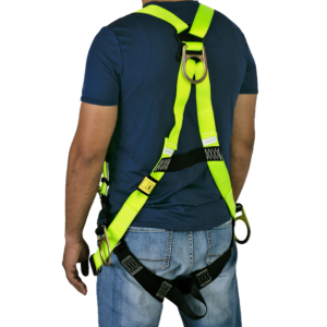 Persona que lleva el arnés de seguridad corporal 3D anticaídas en amarillo y negro de alta visibilidad.
