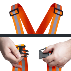 Presenta las correas ajustables y el sistema de cierre en los tirantes reflectantes naranjas JORESTECH
