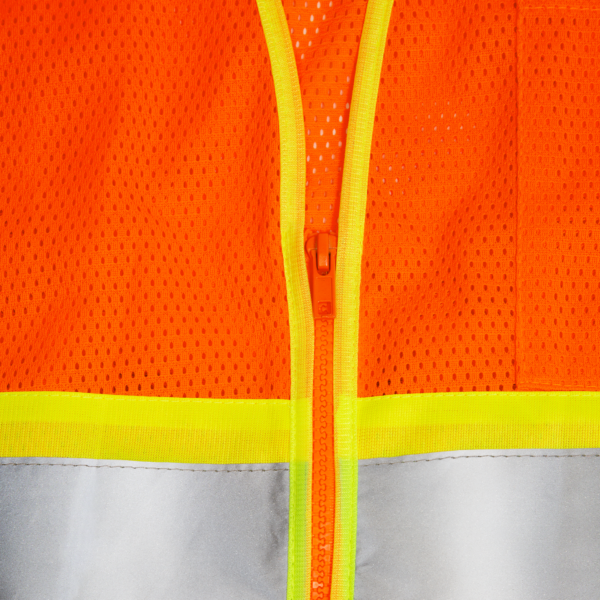 Primer plano de la cremallera del chaleco reflectante naranja JORESTECH