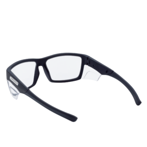 La imagen muestra una vista posterior de un gafas de seguridad JORESTECH con protección lateral transparente para protección de alto impacto. Estas gafas de seguridad con protectores laterales transparentes cumplen con ANSI y tienen montura negra y lentes transparentes de policarbonato. El fondo de la imagen es blanco